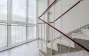 Treppenhauspodest mit Fenstern